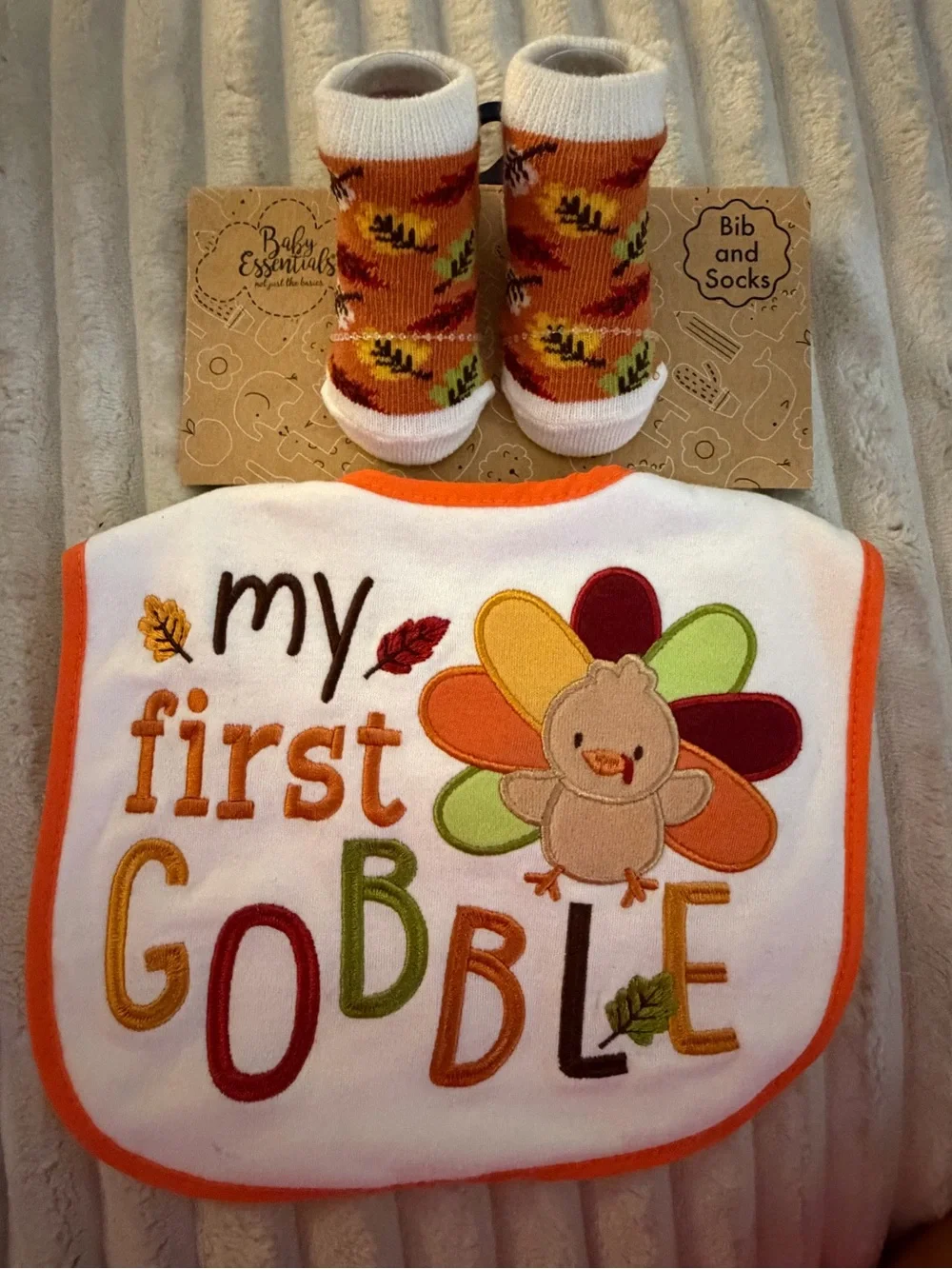 Baby Essentials Baby Bib with Orange Trim